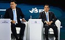 Премьер-министр Монголии Ням-Осорын Учрал (слева) и Вице-президент Мьянмы Ньоу Со на пленарном заседании XI Восточного экономического форума. Фото: Владимир Смирнов, ТАСС