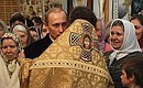 President Putin during the Christmas service at the Church of Our Lady of Vladimir in the village Agapovka.