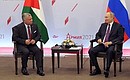 With King Abdullah II of Jordan.