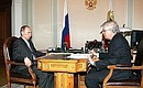С председателем Центрального банка России Сергеем Игнатьевым.