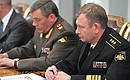 Chief of the General Staff of Russia’s Armed Forces — Fist Deputy Defence Minister Valery Gerasimov (left) and Commander of the Russian Navy Viktor Chirkov at a meeting on naval development and implementing the 2011–2020 naval defence procurement programme.