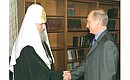 President Putin with Alexii II, the Patriarch of Moscow and All Russia.