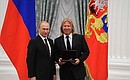 Presenting Russian Federation state decorations. The Honoured Artist of the Russian Federation honorary title is conferred on musical producer Viktor Drobysh.