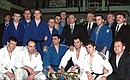 Acting President Vladimir Putin talking with participants in a judo competition between a Chelyabinsk and a St Petersburg teams.