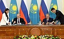Signing of documents. With President of Kazakhstan Nursultan Nazarbayev.