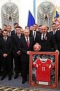 With the players and coaches of the Russia national football team.