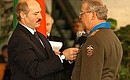 Belarusian President Alexander Lukashenko awarding the Belarusian Order of Honour to Konstantin Totsky, Director of Russia\'s Federal Border Service.