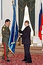 Minister of Civil Defence, Emergencies and Disaster Relief Sergei Shoigu receiving a personal standard.