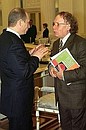 President Putin with playwright and historian Edward Radzinsky after a session of the Council for Culture and the Arts.