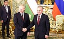 С Президентом Республики Узбекистан Шавкатом Мирзиёевым. Фото: Артём Геодакян, ТАСС