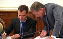 Before the start of a Security Council meeting. Prime Minister Dmitry Medvedev and Chief of Staff of the Presidential Executive Office Sergei Ivanov.