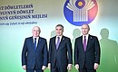 With President of Turkmenistan Gurbanguly Berdimuhamedov, centre, and Chairman of the Executive Committee – CIS Executive Secretary Sergei Lebedev before a meeting of the CIS Heads of State Council.