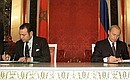 President Putin and King Mohammed VI of Morocco signing the Declaration on Strategic Partnership between Russia and Morocco.