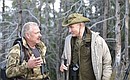 Vladimir Putin spent the weekend in Tyva. With Sayano-Shushensky Nature Reserve Director Gennady Kiselev.