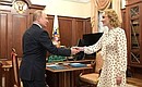 С Уполномоченным при Президенте по правам ребёнка Марией Львовой-Беловой.