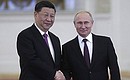 Official welcoming ceremony. With President of the People’s Republic of China Xi Jinping. Photo: TASS