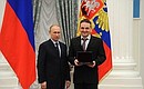 Presenting state decorations to prominent figures in culture and the arts. Honorary title of National Artist of Russia is conferred to Russian State Circus Company performer Askold Zapashny.