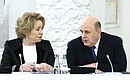 Speaker of the Federation Council Valentina Matviyenko and Prime Minister Mikhail Mishustin at the State Council meeting on increasing the role and prestige of teachers and mentors. Photo: Artem Geodakyan, TASS