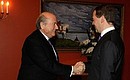 С президентом Международной федерации футбола (ФИФА) Йозефом Блаттером.