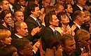 A gala concert featuring world opera and ballet stars. In the first row (left to right) — Prime Minister of Luxembourg Jean-Claude Juncker, Lyudmila Kuchma and Ukrainian President Leonid Kuchma, Uzbek President Islam Karimov. In the second row — Lyudmila and Vladimir Putin, British Prime Minister Tony Blair and his wife, Cherie, and French President Jacques Chirac and his wife, Bernadette.