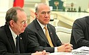 Secretary-General of the Organisation for Economic Co-operation and Development (OECD) Angel Gurria and OECD Deputy Secretary-General Pier Carlo Padoan.
