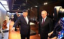 At an exhibition of Chinese arts and crafts. With President of China Xi Jinping.