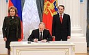 Церемония подписания законов о принятии Крыма и Севастополя в состав России.