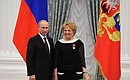 Presenting Russian Federation state decorations. The Order for Services to the Fatherland, IV degree, is awarded to Deputy Chairperson of the State Duma Lyudmila Shvetsova.