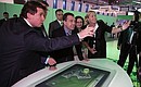 Visiting the display stand of Sberbank, partner companie of the St Petersburg International Economic Forum.