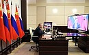 Talks with President of China Xi Jinping (via videoconference).