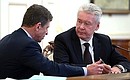 Before the meeting with Government members. Deputy Prime Minister Dmitry Kozak (left) and Moscow Mayor Sergei Sobyanin.