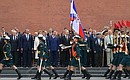 Vladimir Putin laid a wreath at the Tomb of the Unknown Soldier in the Alexander Garden. The ceremony was concluded with the national anthem of Russia and a march of military formations.