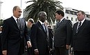 At an official welcome ceremony with South African President Tabo Mbeki.
