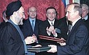 Signing a treaty on principles guiding relations between Russia and Iran.