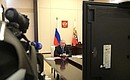 Совещание с постоянными членами Совета Безопасности Российской Федерации в режиме видеоконференции.