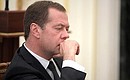 Prime Minister Dmitry Medvedev before the meeting on economic issues.