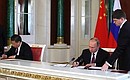 Vladimir Putin and Xi Jinping sign a Joint Statement of the Russian Federation and the People’s Republic of China on the Further Expansion of Comprehensive Partnership and Strategic Cooperation and a Joint Statement of the Russian Federation and the People’s Republic of China on the Current Status of Global Affairs and Important International Issues.