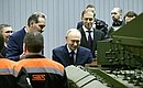 During a visit to the Uralvagonzavod Research and Production Corporation. With Uralvagonzavod Director General Alexander Potapov and Deputy Prime Minister – Minister of Industry and Trade Denis Manturov (right). Photo by Ramil Sitdikov, RIA Novosti