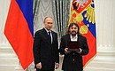 Presenting state decorations to prominent figures in culture and the arts. Honorary title of Honoured Cultural Worker of the Russian Federation is conferred to artist Nikolai Korobeynikov (Tomsk).