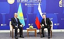 С Президентом Республики Казахстан Касым-Жомартом Токаевым. Фото ТАСС