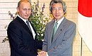 With Japanese Prime Minister Junichiro Koizumi.