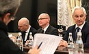Before a meeting on the drafting of the Address to the Federal Assembly. Presidential Aide Andrei Belousov, First Deputy Chief of Staff of the Presidential Executive Office Sergei Kiriyenko and First Deputy Prime Minister and Finance Minister Anton Siluanov (from right to left).