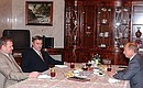С главой администрации Чеченской Республики Ахматом Кадыровым и Председателем Правительства Михаилом Касьяновым.