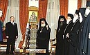 President Putin with Archbishop of Athens and all Greece Christodoulos, Synod members, and representatives of the Archbishopric.