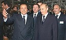На заводе по производству стиральных машин. С Председателем Совета министров Италии Сильвио Берлускони.