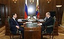 С Председателем Правительства Владимиром Путиным. Фото РИА «Новости»