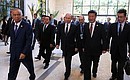 По окончании заседания Совета глав государств – участников Шанхайской организации сотрудничества в расширенном составе. С Президентом Узбекистана Исламом Каримовым (слева) и Председателем Китайской Народной Республики Си Цзиньпином.
