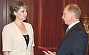 President Vladimir Putin meeting Irina Lyachina, the widow of the commander of the sunken nuclear submarine Kursk.