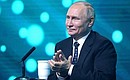 Vladimir Putin took part in the main discussion at the AI Journey 2021, the international conference on artificial intelligence and data analysis. Photo: TASS