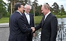 With European Commission President Jose Manuel Barroso (left) and European Council President Herman Van Rompuy (centre).